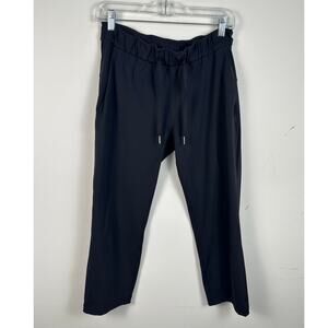 Lululemon On The Fly Pant Womens Size 6 Cropped Black Drawstring EUC
